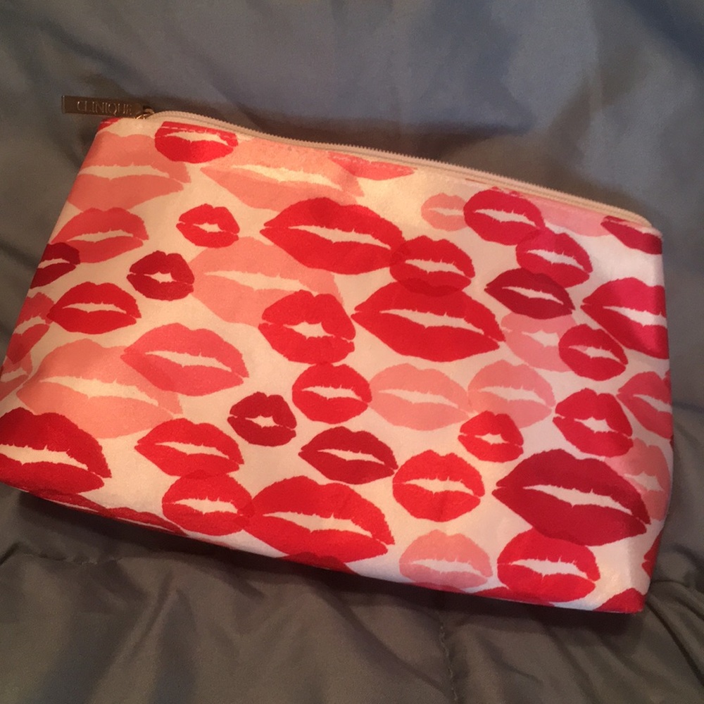 Clinique cosmetic bag /Lips print 9”x5.5” x3”